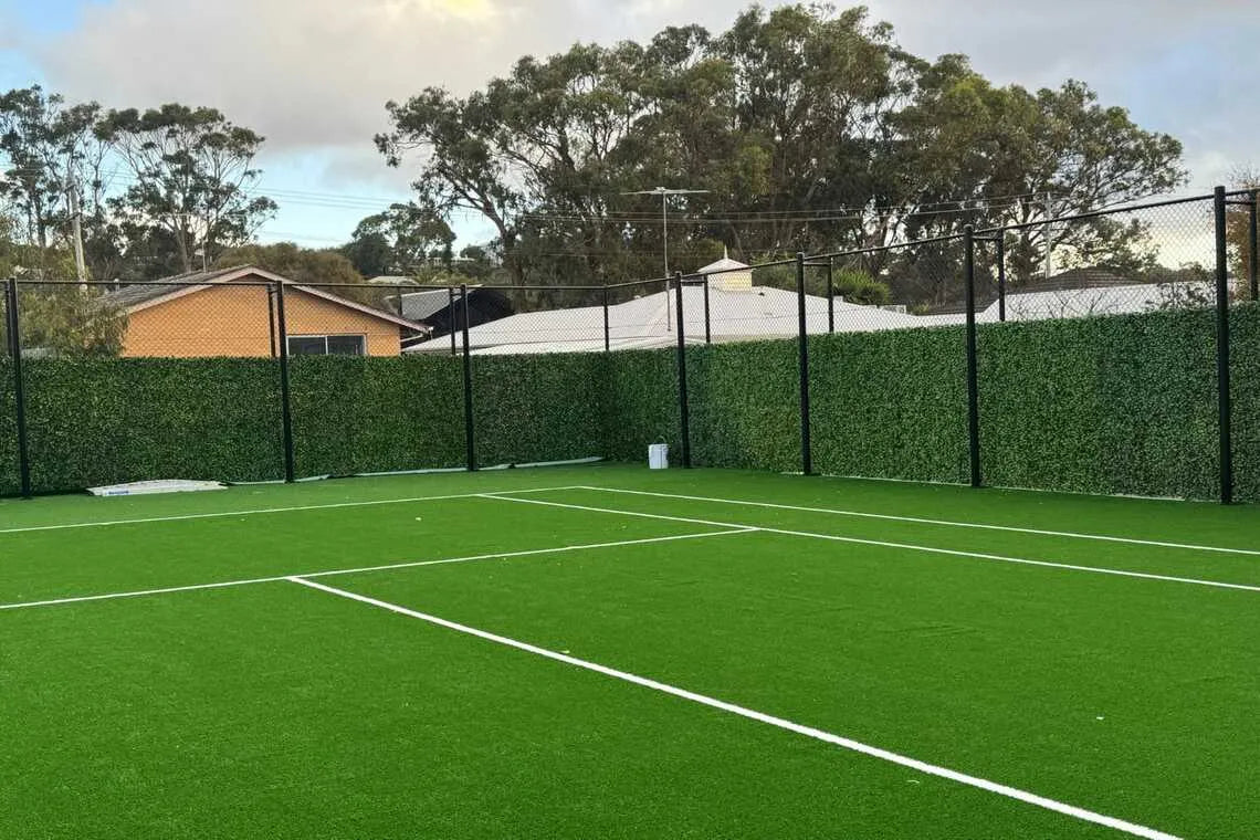 Tennis court fake greenery