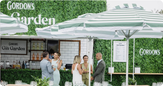 lively outdoor bar gordons garden with green foliage wall