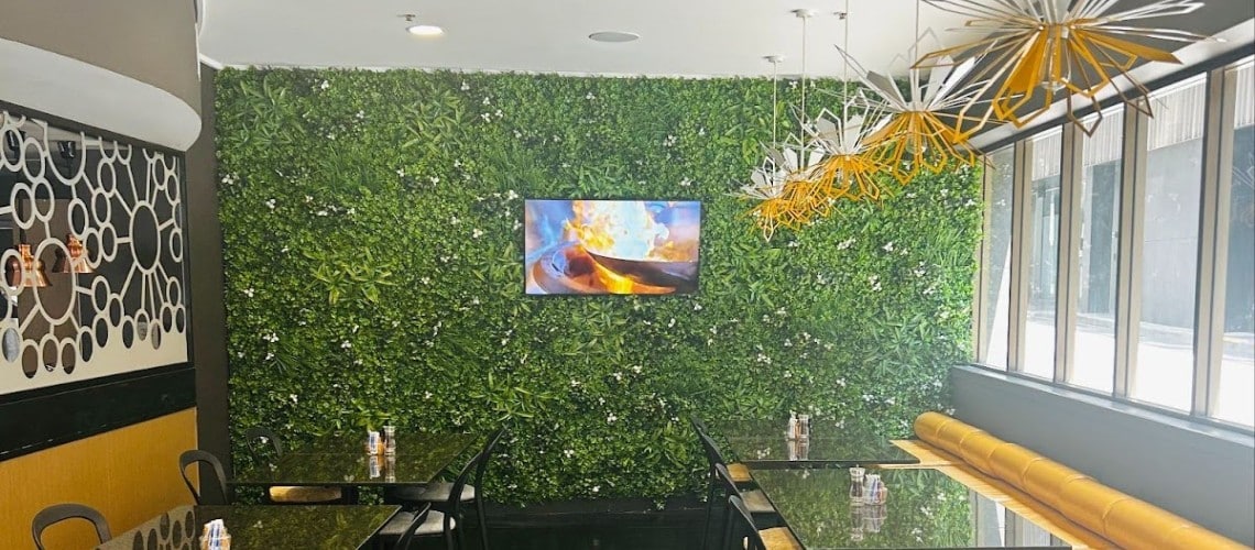 Why and How the Accor Group Used an Artificial Green Wall in a Hotel Cafe