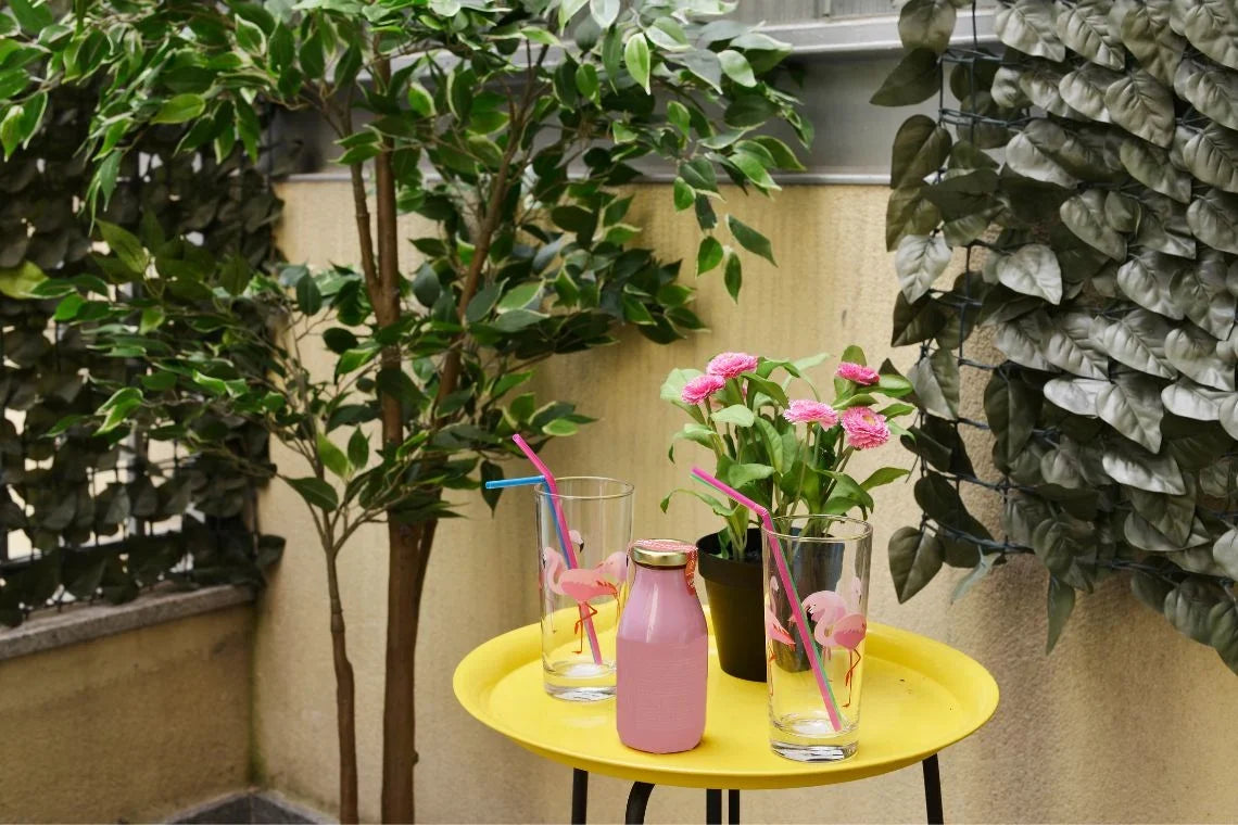 backyard artificial tree and roses decor