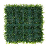 Artificial green wall panel with grid structure on a white background