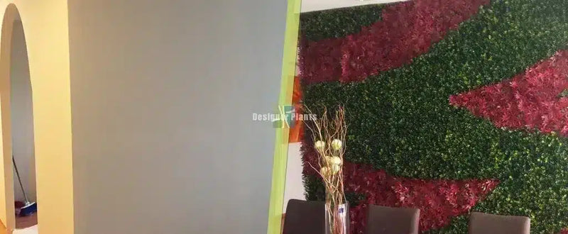 Before/After Photo of green walls onto a concrete wall.