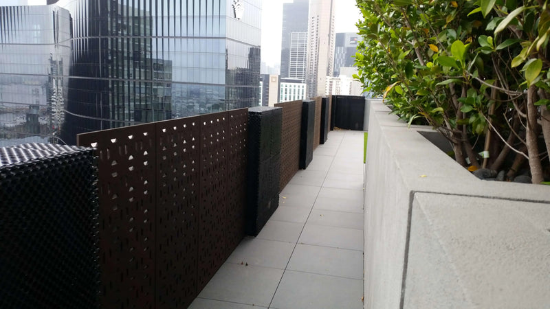 Before – Penthouse apartment where fake photinia hedge panels were installed