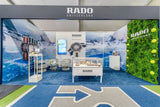 Rado Switzerland booth with display of watches at an event