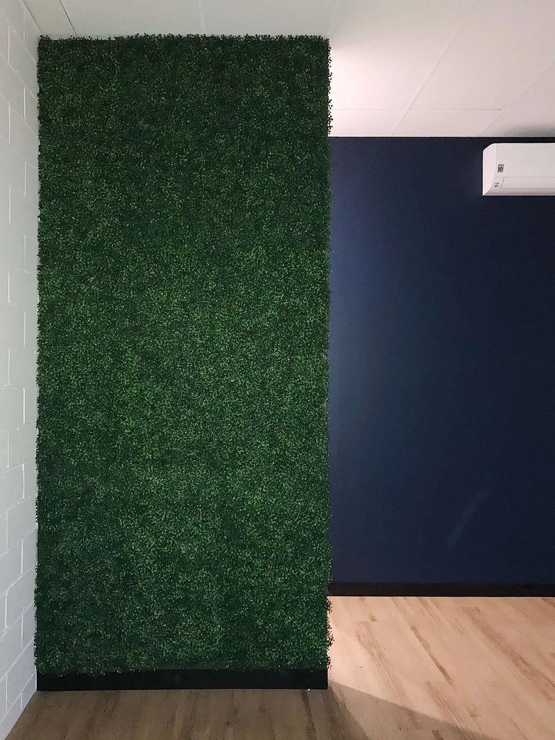 After – Artificial boxwood wall installed onto an office wall
