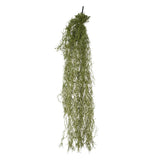 A long, hanging green mossy branch or artificial plant stem with fine, wispy strands, suspended against a plain white background.
