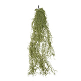 A hanging artificial green mossy plant with delicate feathery strands, suspended from a thin black wire against a plain white background.