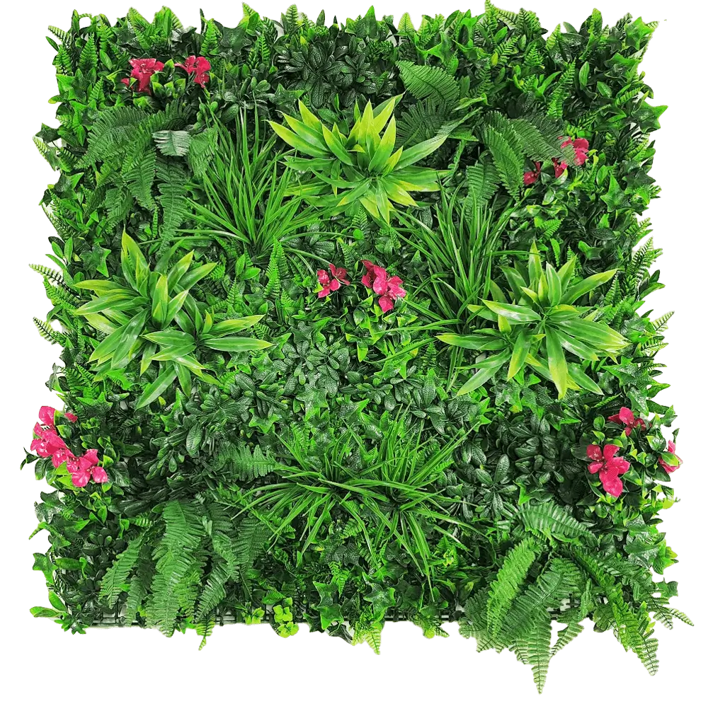 Artificial green wall with various green plants and pink flowers on a white background