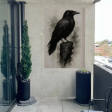 Artificial Cypress Pine Tree UV Resistant 1.8M displayed in a tall black planter on a modern outdoor balcony, positioned beside a glass sliding door.