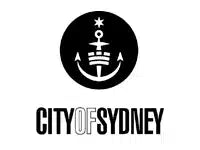 The official City of Sydney logo, featuring a black circular emblem with an anchor and a white star above the words 'CITY OF SYDNEY' in black sans-serif font on a white background.