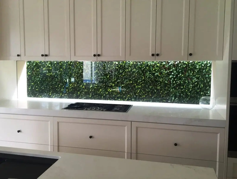 Expanding fake plant laurel leaf trellis