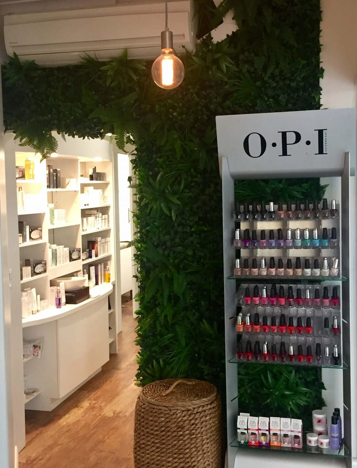 A nail polish display stand branded O.P.