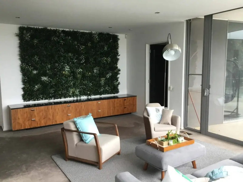 Lush green wall made with plants for entertaining area