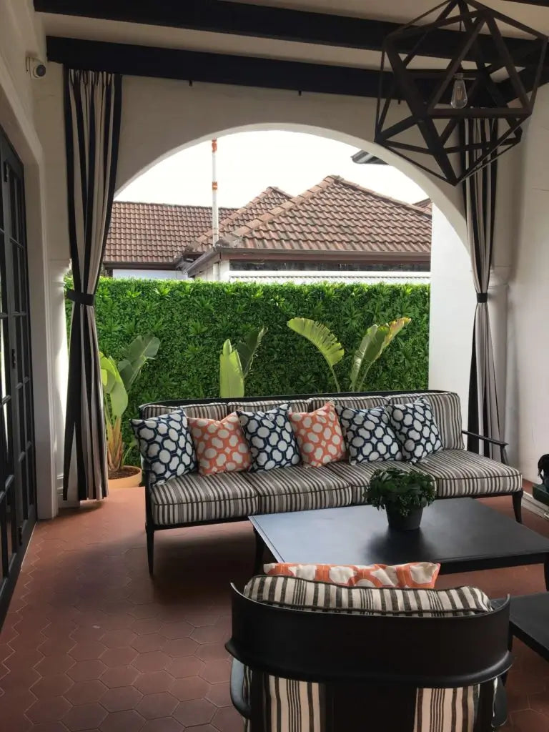 Fake green wall in an outdoor entertaining area