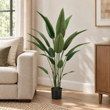 47.2-inch Bird of Paradise artificial tree in its black nursery pot in a contemporary living room