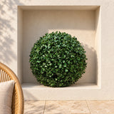 40cm artificial boxwood topiary ball in a square courtyard niche.