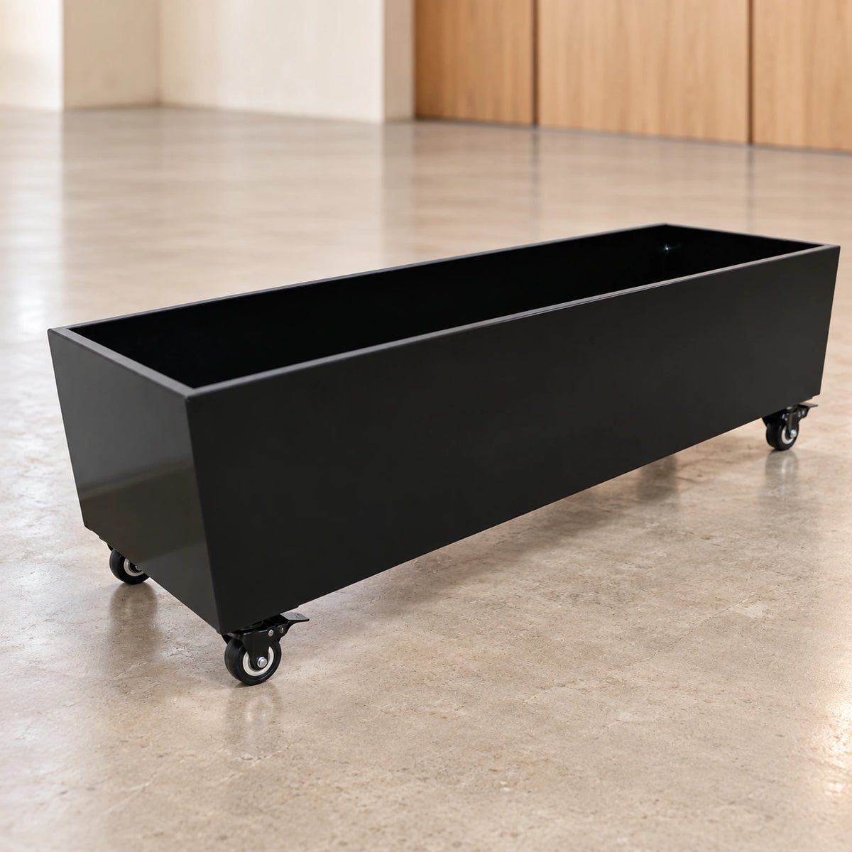 Black Metal Planter Medium + Wheels - styled product image A