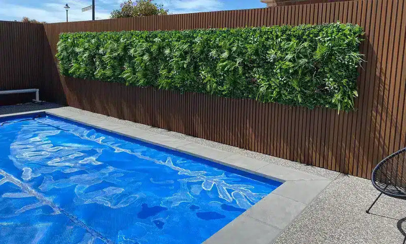 Sophisticated Pool Area with Artificial Vista Green Wall Panel