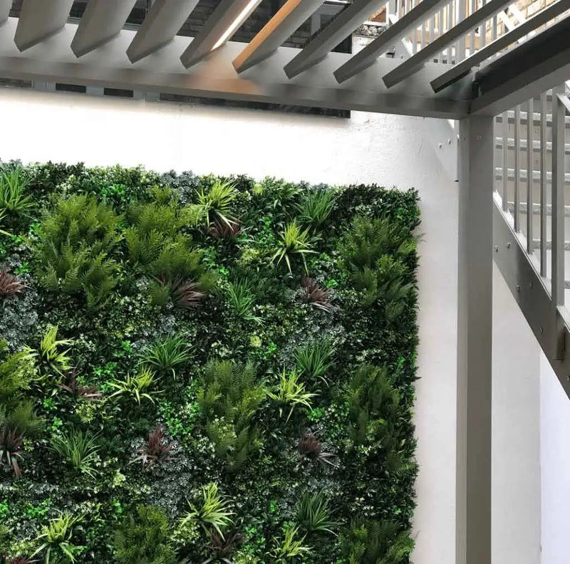 Premium artificial green wall installed in an apartment building
