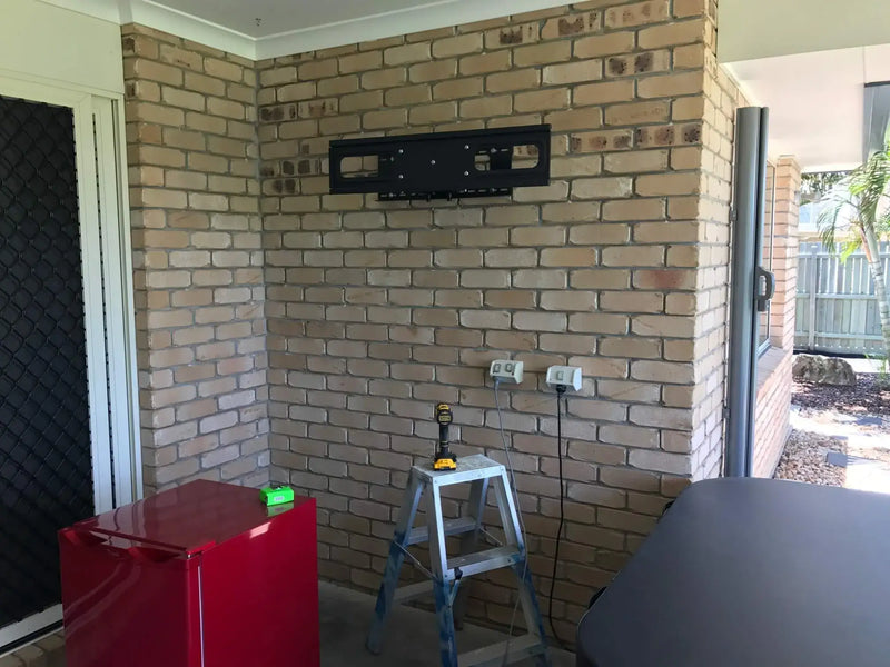 Before installing a vertical garden onto a green wall