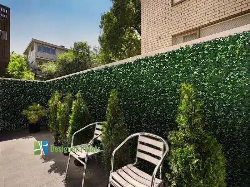 After – A plain brick fence in Melbourne in need of some beautification.