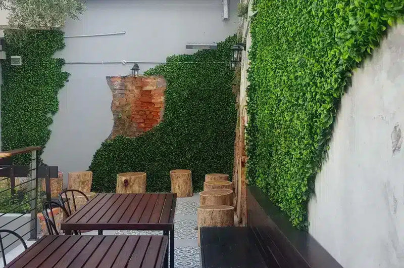 Artificial fake jasmine hedge cut to shape