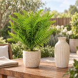 40cm artificial lady fern stem styled in a small stone pot on an outdoor patio console.