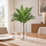 One 40cm artificial maidenhair fern stem in a clear glass vase on a dining table; vase and tableware sold separately.