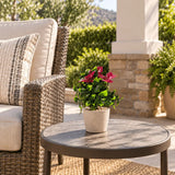 12-inch UV-resistant pink bougainvillea artificial stem in a small pot on a covered patio table