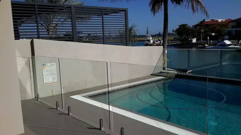 Before- Pool side area brick wall Brisbane with artificial mixed ivy (spring sensation) panels of fake hedge panels