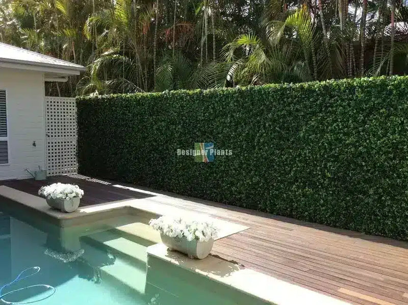 Pool landscaping with artificial spring sensation hedge tiles