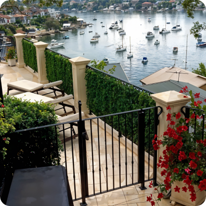 scenic waterfront terrace with boats and greenery