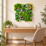 50cm square artificial succulent wall panel above a timber home office desk.