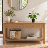 50cm artificial white calla lily in its supplied black pot on an oak entry console; furniture shown for styling.
