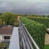 Balcony With Artificial Green Wall Plants