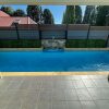 Artificial Boxwood Hedge Around Pool in Melbourne