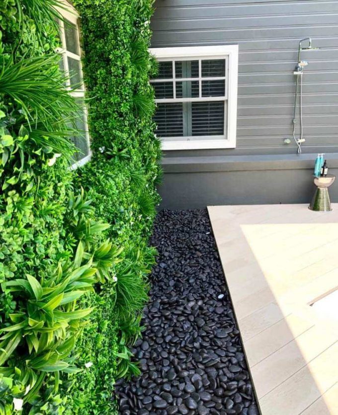 White oasis vertical garden on a house wall