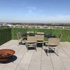 artificial boxwood hedges have been installed to create privacy