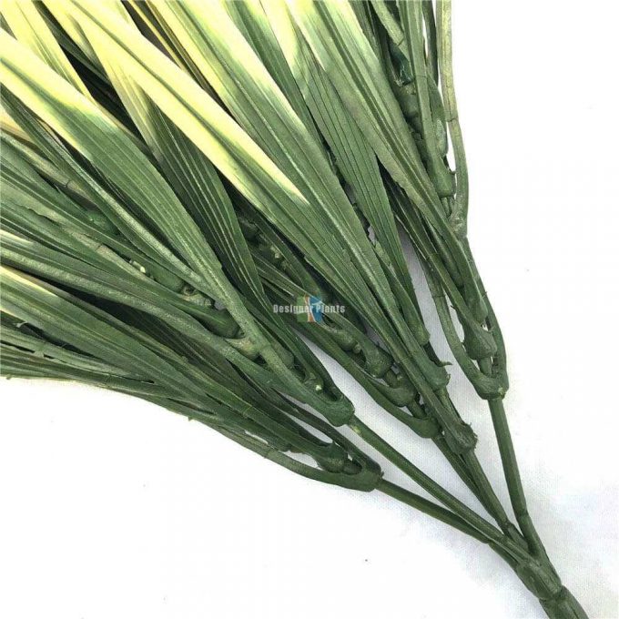 Faux artificial green and yellow grass stem UV