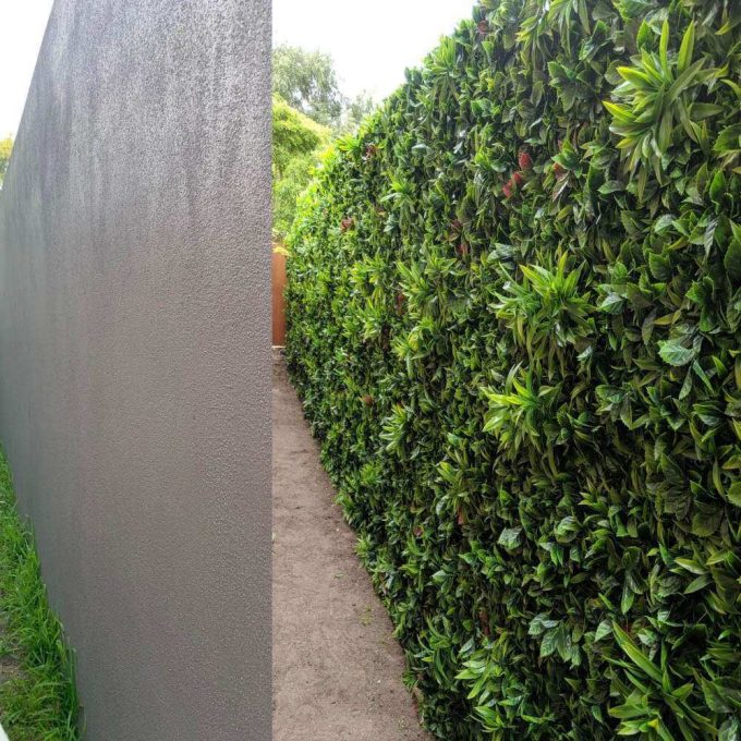 fake green meadow fake hedge wall