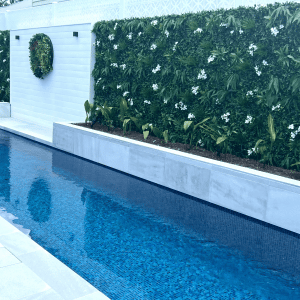Artificial Green Wall panels with added flowers