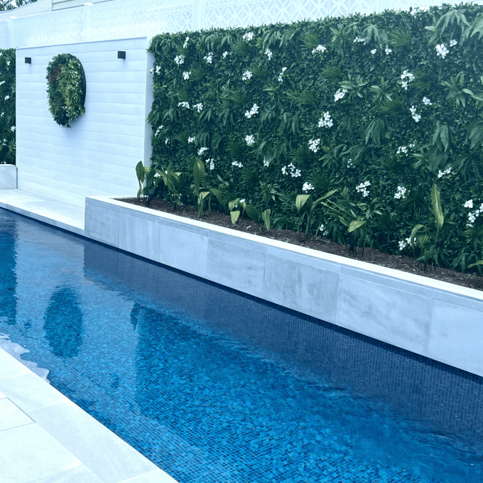 Artificial Green Wall panels with added flowers