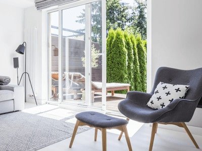 Low maintenance garden - lounge room opening up to a small garden