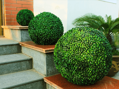 Artificial topiary plants for home - topiary balls large on front door entrance