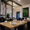 Dining Area With Artificial Plants