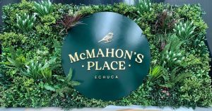 Commercial Business Signage using an artificial green wall panels