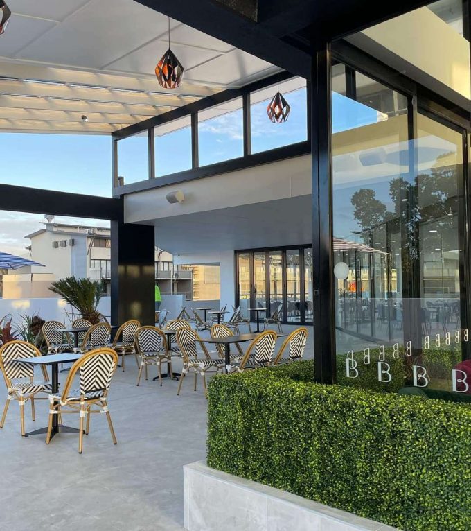 artificial boxwood hedge installed at a hotel