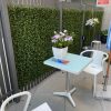 Relaxing Apartment Outdoor Area made possible with Premium Natural Buxus Hedge Panels