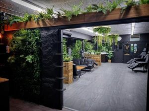 bring nature into tattoo shop with artificial plants