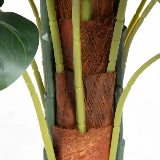 Imitation Monstera plant featuring lush leaves, perfect for tropical-themed interiors.
